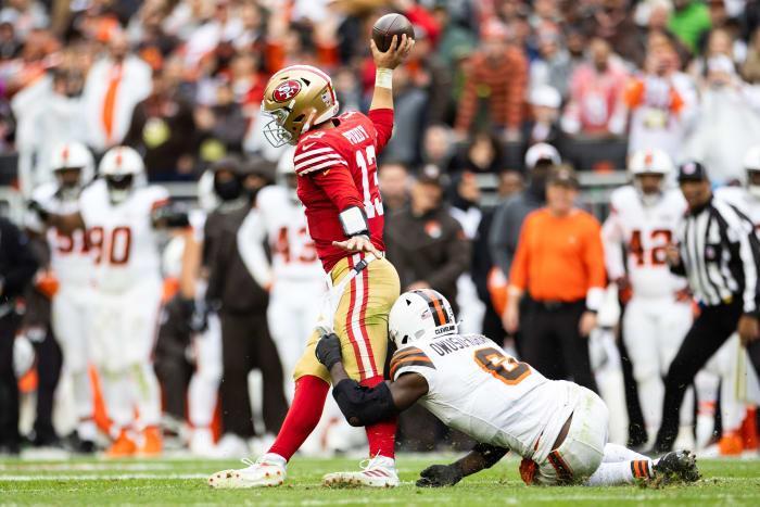 Oct 15, 2023; Cleveland, Ohio, USA; Cleveland Browns linebacker Jeremiah Owusu-Koramoah (6) tackles San Francisco 49ers quarterback Brock Purdy (13) as he throws the ball away during the fourth quarter at Cleveland Browns Stadium.